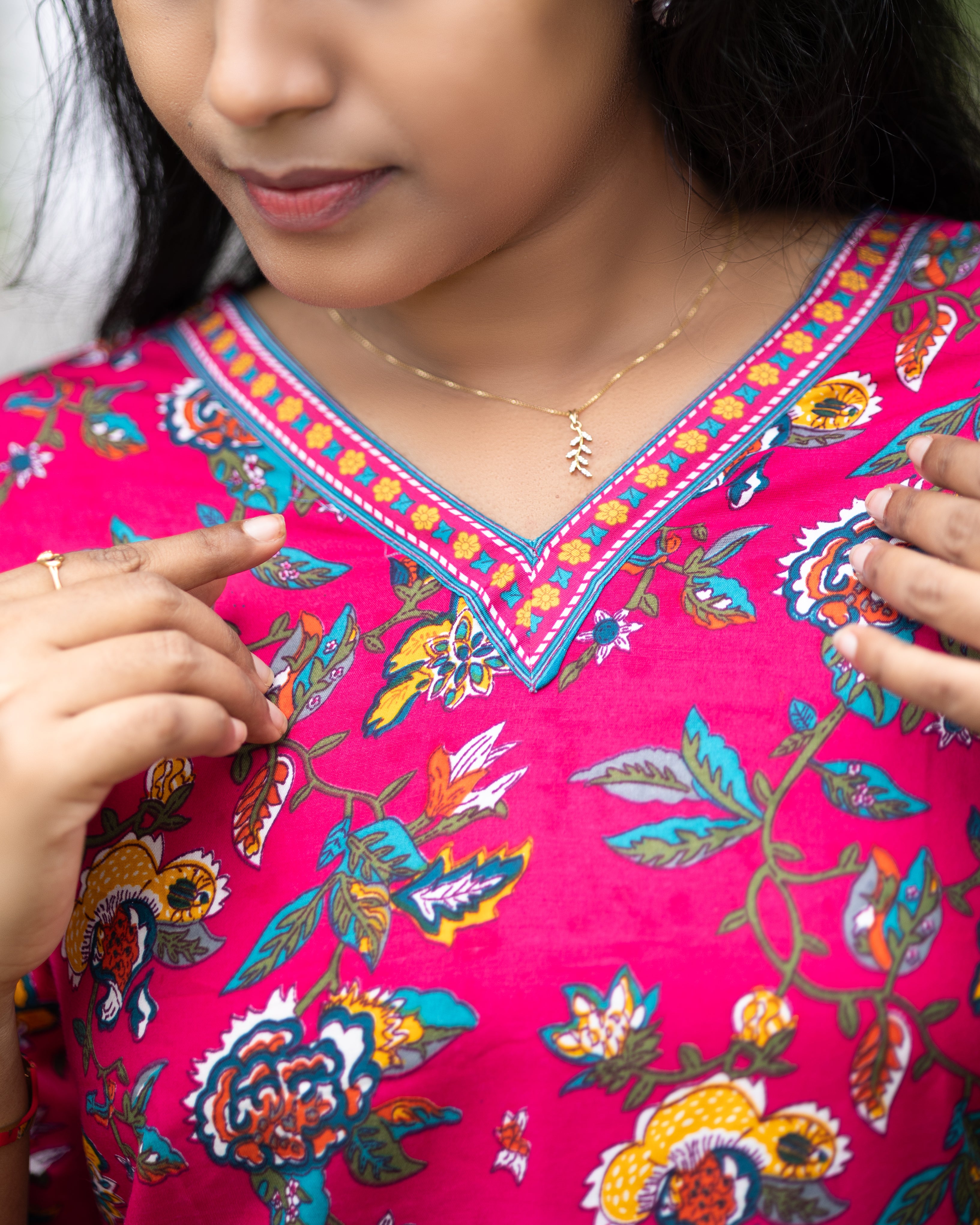 Jaipuri Cotton Short Kurti with Vibrant Floral Vine Print and Neck Embroidery Detailing